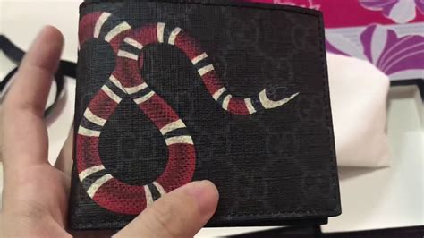 real gucci belt with a snake logo on it|Gucci kingsnake wallet black.